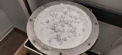 A Glimpse into the Drum Mill: Co-Crystal Powder (Rac-Ibuprofen:Nicotinamide) with Stainless Steel Balls.